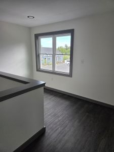 open nook area at the top of the stairs outside bedrooms